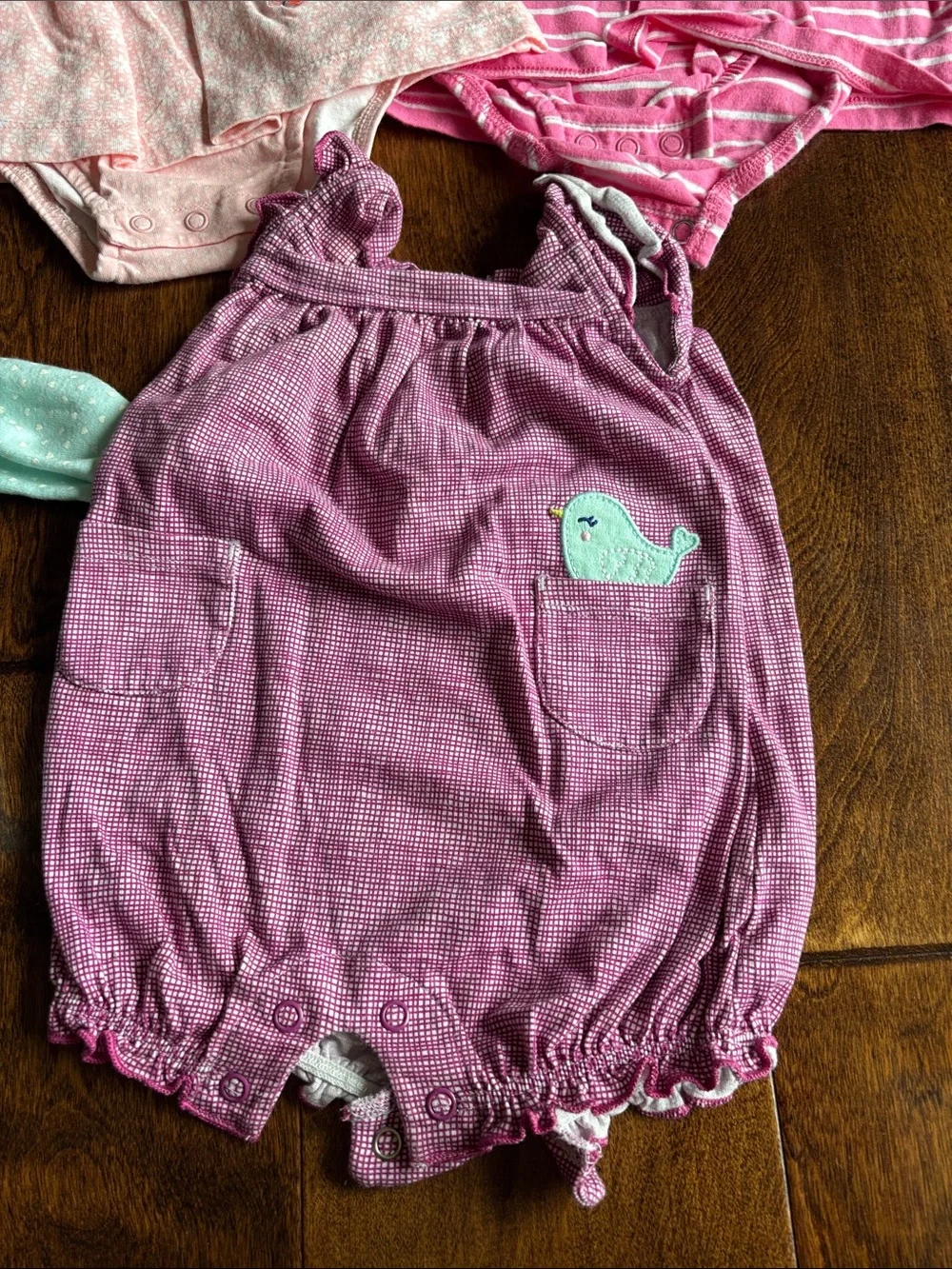 6 tops and 3 rompers with various designs